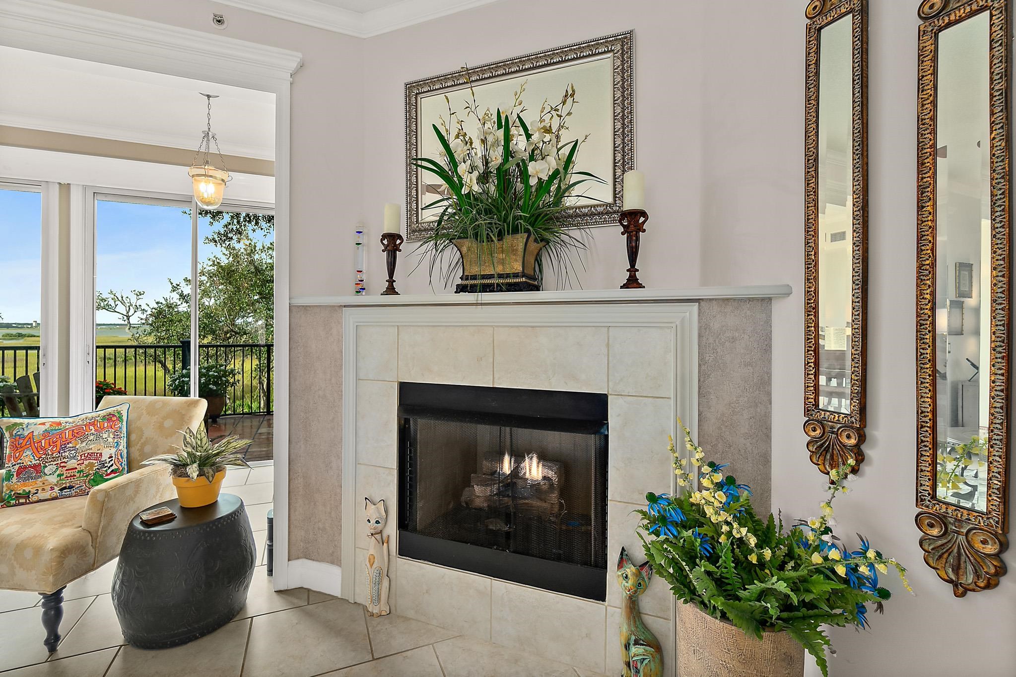 1602 Windjammer Lane St. Augustine, FL 32084 - Photo 12 of 85 a living room with furniture and a fireplace