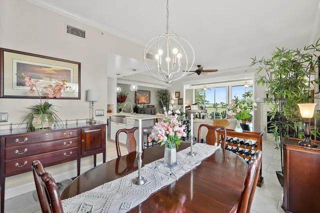 a bedroom with a bed a couch and a window