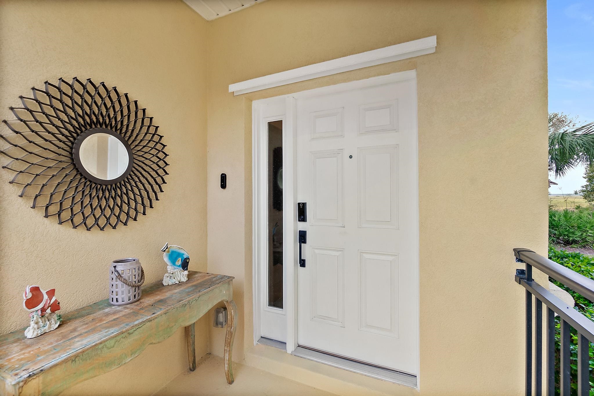 1602 Windjammer Lane St. Augustine, FL 32084 - Photo 6 of 85 a bathroom with a sink mirror vanity and toilet