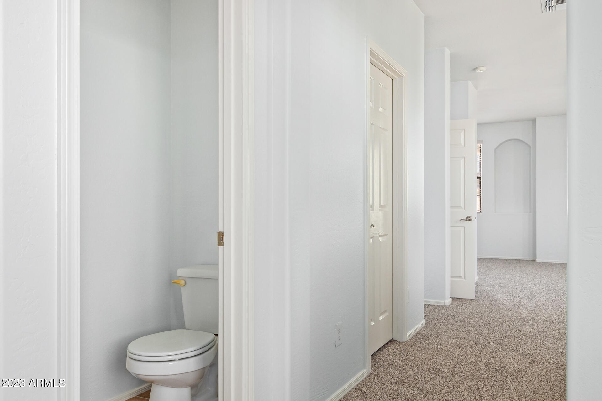2390 West Sleepy Ranch Road Phoenix, AZ 85085 - Photo 17 of 27 a bathroom with a granite countertop toilet a sink and a mirror