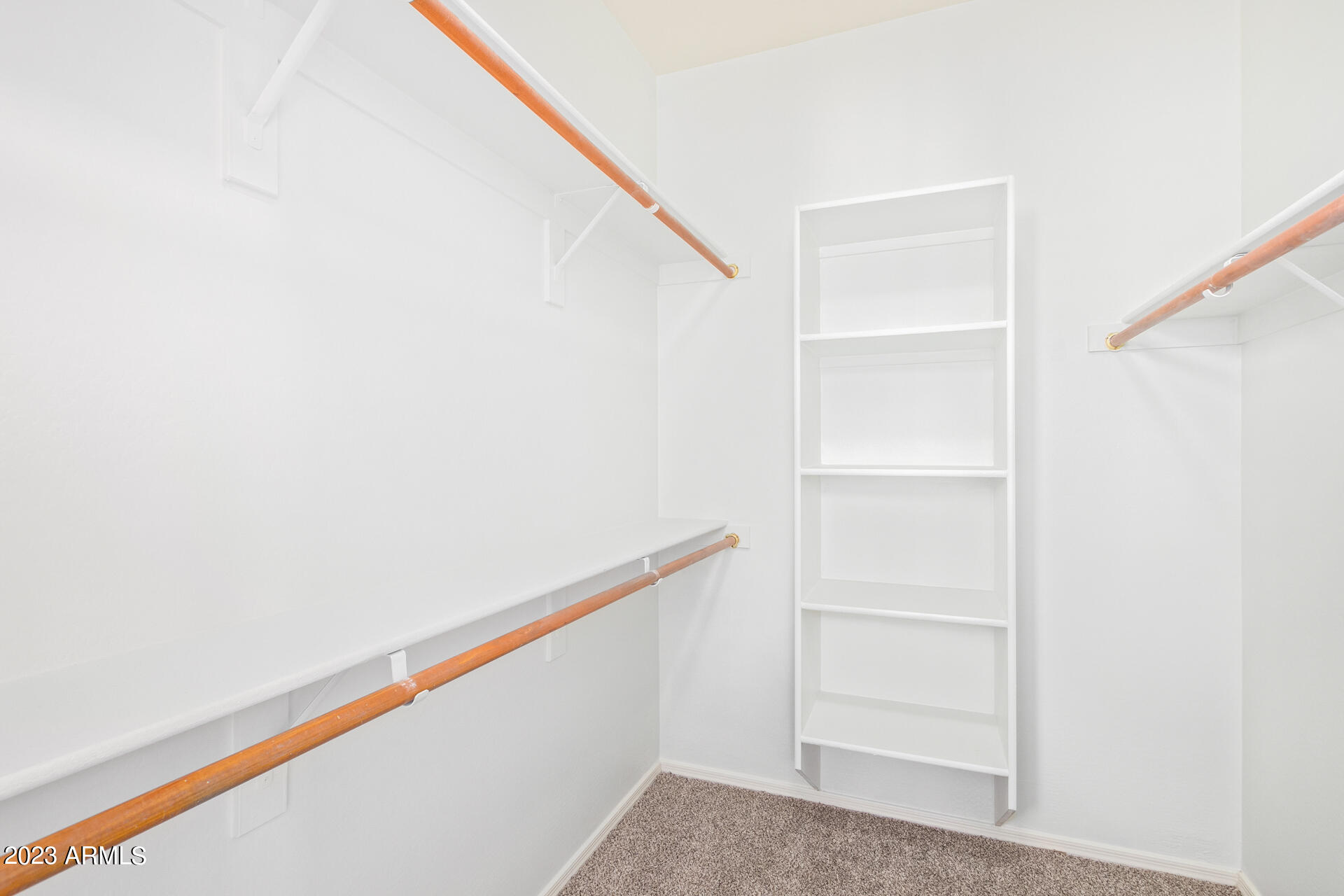 2390 West Sleepy Ranch Road Phoenix, AZ 85085 - Photo 18 of 27 a view of an empty walk in closet