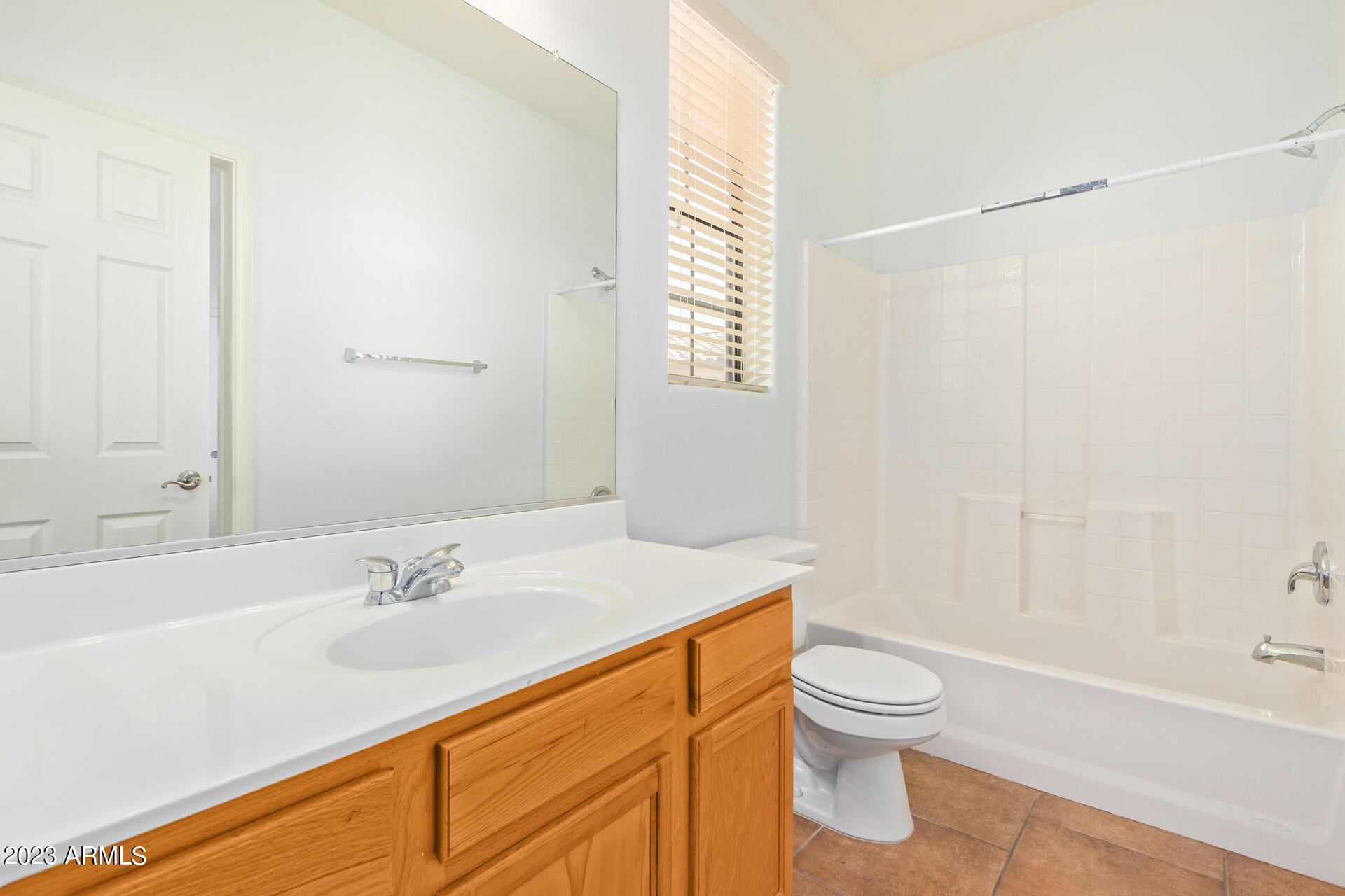 2390 West Sleepy Ranch Road Phoenix, AZ 85085 - Photo 21 of 27 a bathroom with a sink toilet and shower