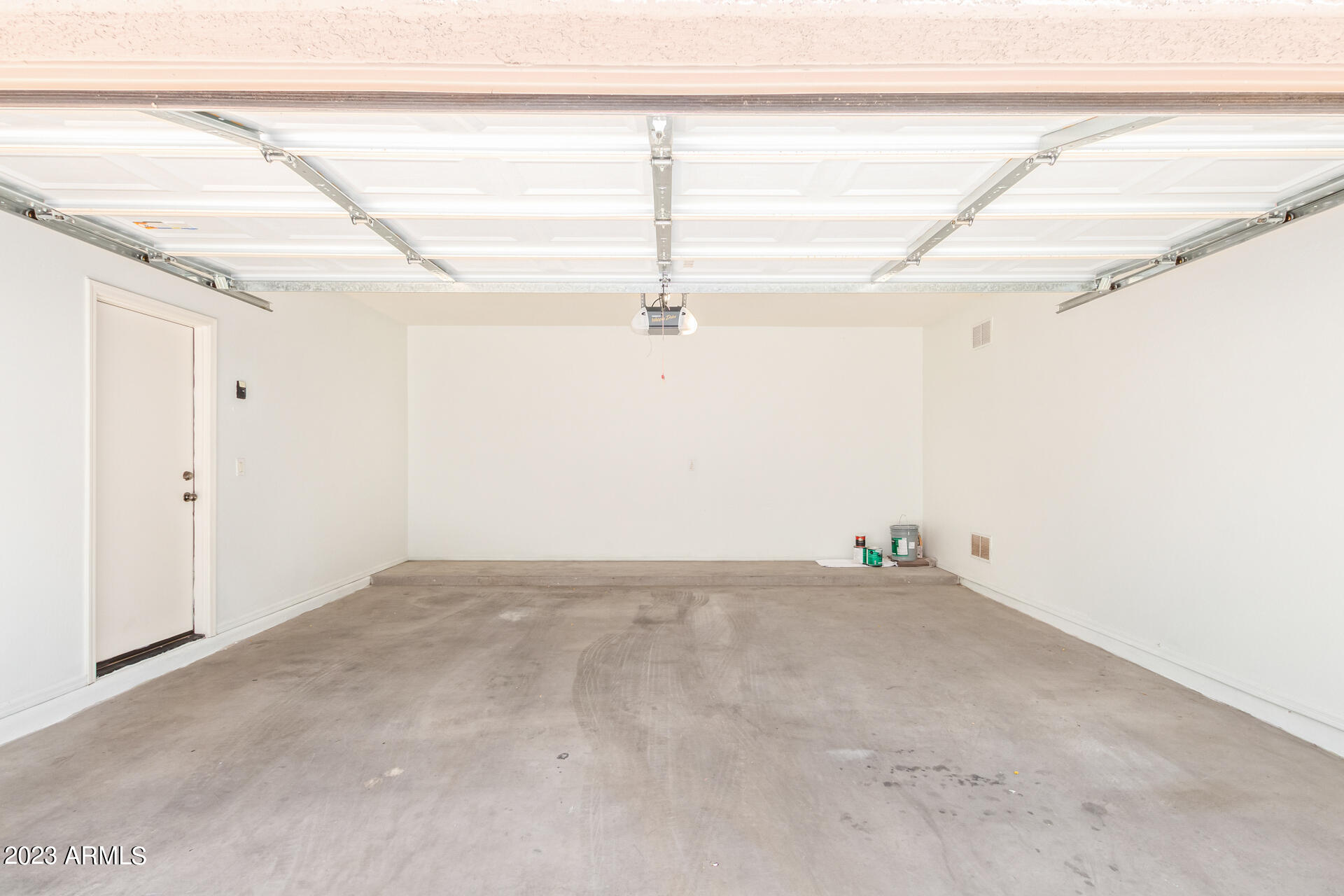 2390 West Sleepy Ranch Road Phoenix, AZ 85085 - Photo 25 of 27 a view of a room with racks on the wall