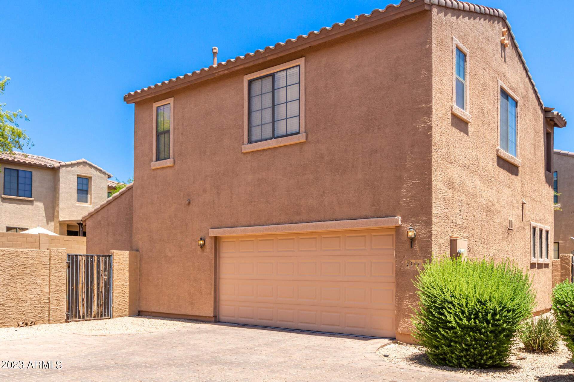 2390 West Sleepy Ranch Road Phoenix, AZ 85085 - Photo 26 of 27 a view of a house with a street