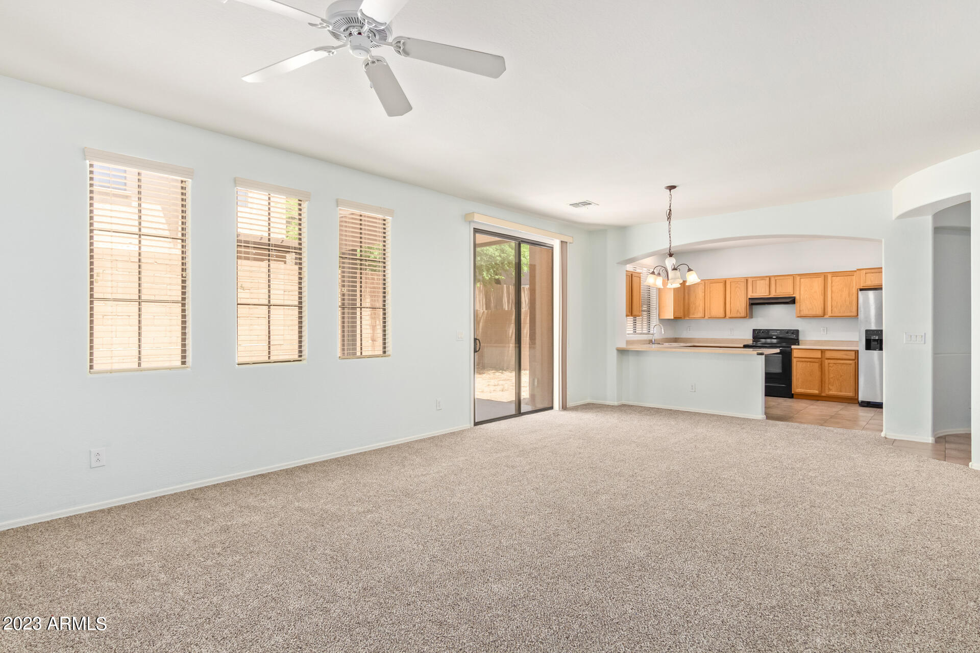 2390 West Sleepy Ranch Road Phoenix, AZ 85085 - Photo 5 of 27 a view of an empty room with a window