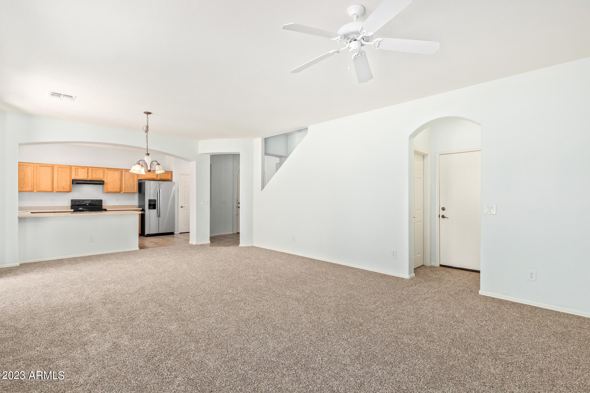 2390 West Sleepy Ranch Road Phoenix, AZ 85085 - Photo 7 of 27 a view of a kitchen with cabinet and a ceiling fan
