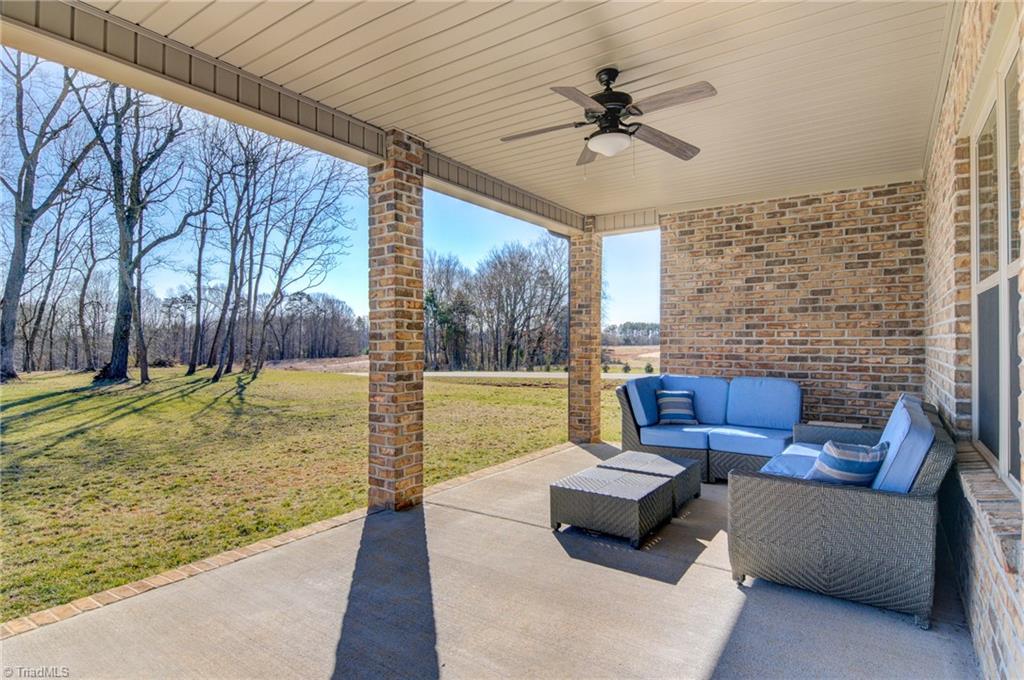 5304 Sicily Street Oak Ridge, NC 27310 - Photo 20 of 23 Upstairs full bath with gorgeous tile and granite.