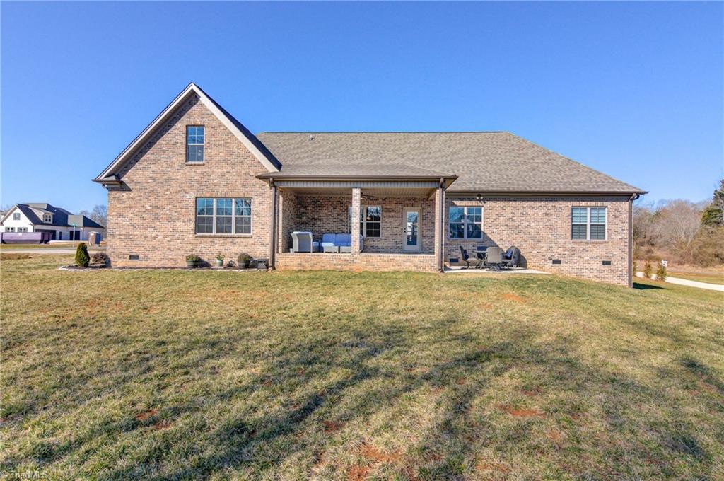 5304 Sicily Street Oak Ridge, NC 27310 - Photo 22 of 23 Large covered back patio for outdoor entertaining!