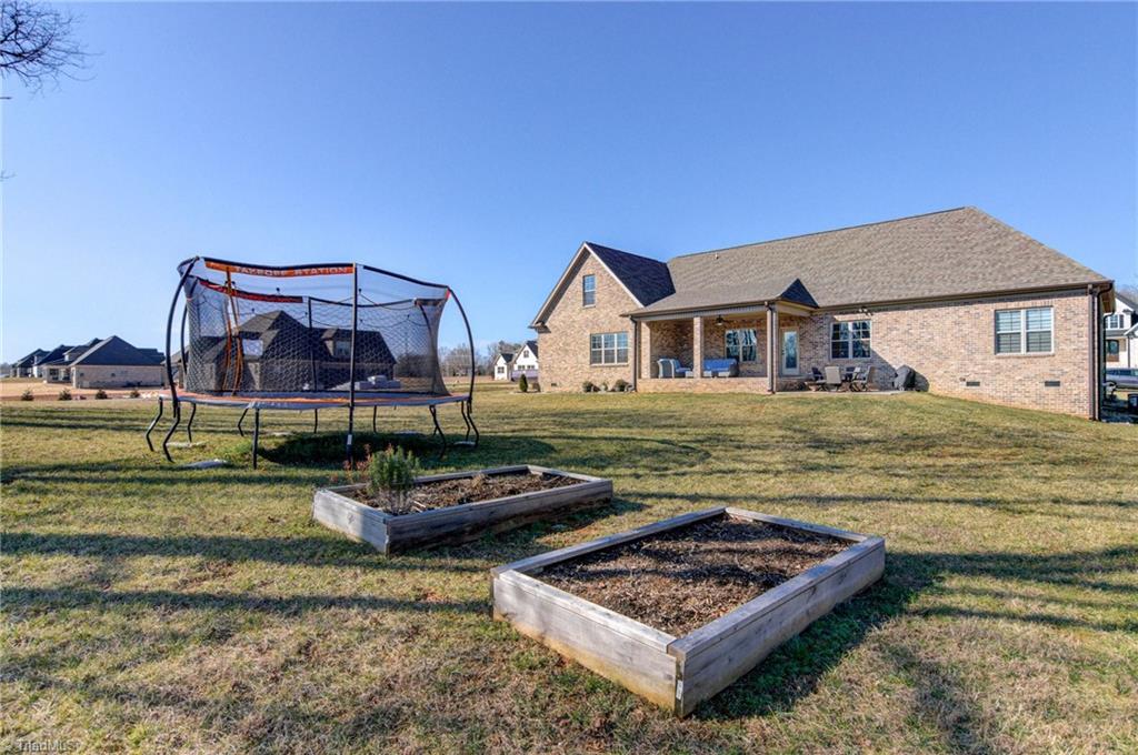 5304 Sicily Street Oak Ridge, NC 27310 - Photo 23 of 23 Additional patio space for grilling and dining outside!