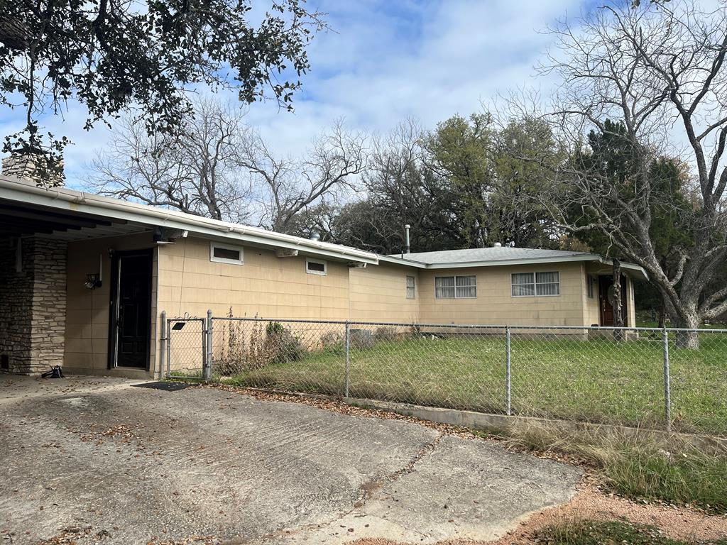 450 Kc 450 Junction, TX 76849 - Photo 1 of 39 front view of a house with a yard