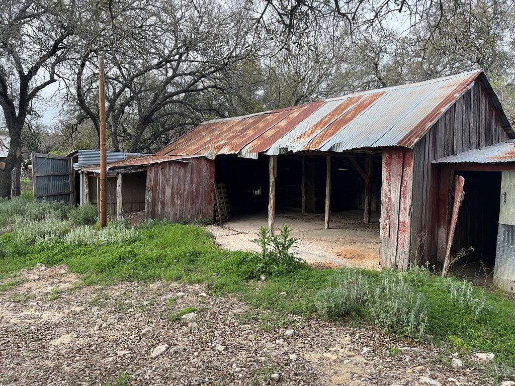 450 Kc 450 Junction, TX 76849 - Photo 27 of 39 a front view of a house with a yard and porch