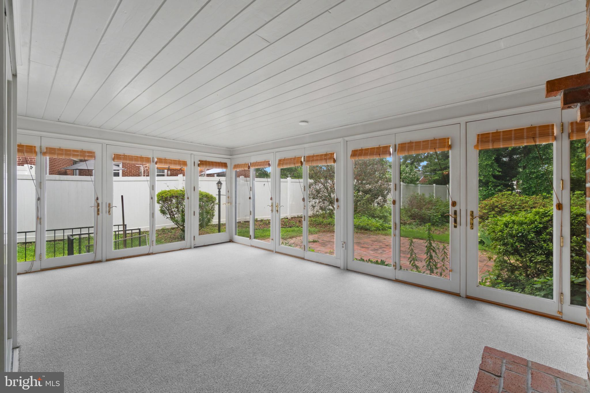 909 Weatherbee Road Towson, MD 21286 - Photo 21 of 51 a view of a building with porch and garden
