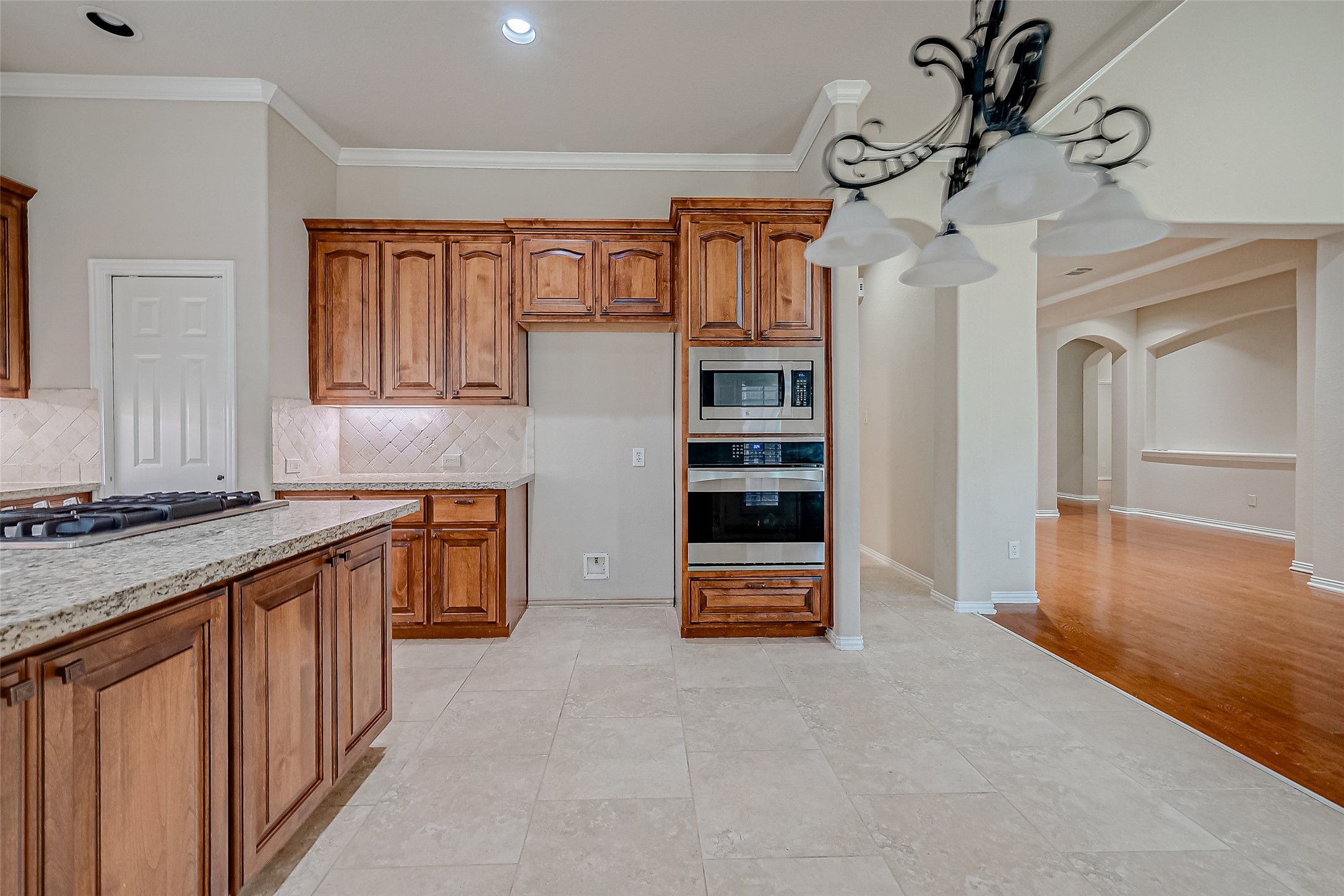 7206 Spring Meadow Lane Katy, TX 77494 - Photo 20 of 50 a kitchen with stainless steel appliances granite countertop a refrigerator and a sink