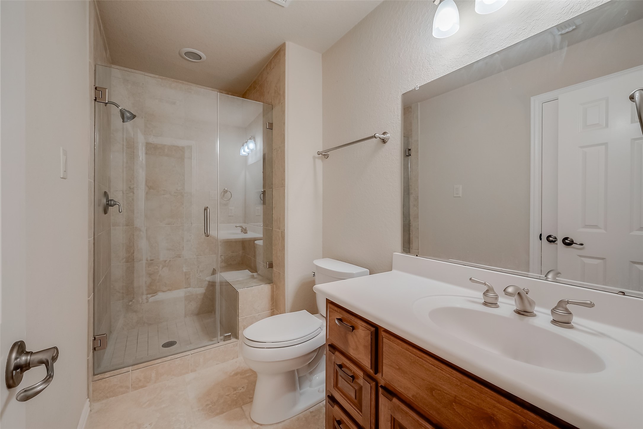 7206 Spring Meadow Lane Katy, TX 77494 - Photo 33 of 50 a bathroom with a sink a toilet and shower