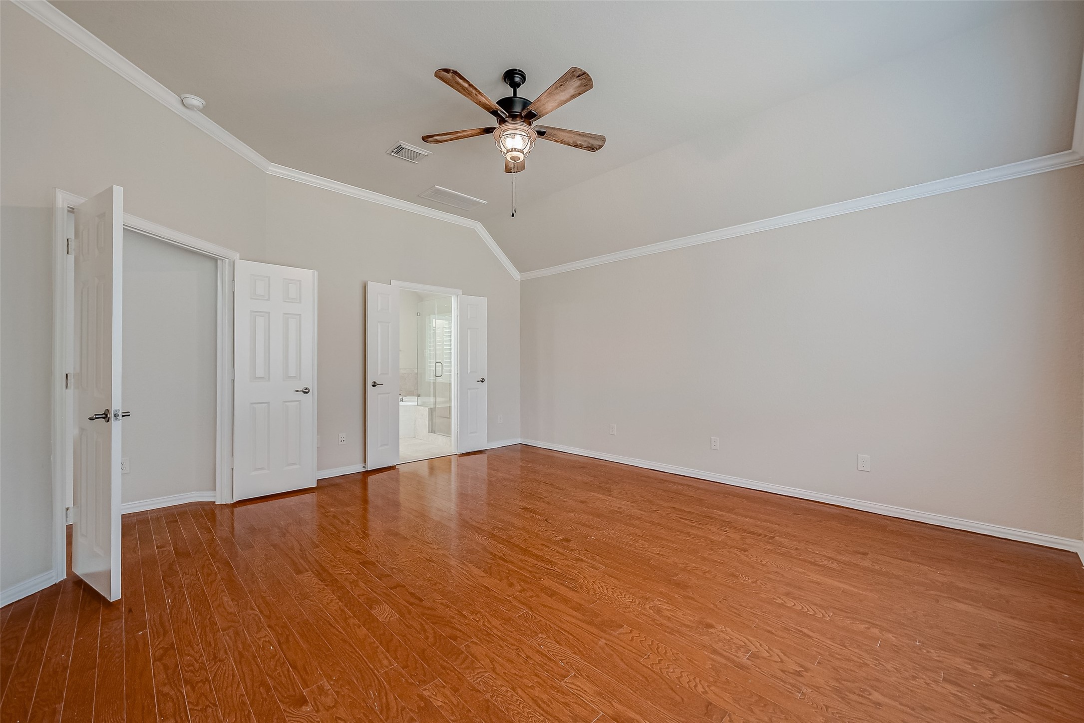 7206 Spring Meadow Lane Katy, TX 77494 - Photo 36 of 50 a view of an empty room with wooden floor
