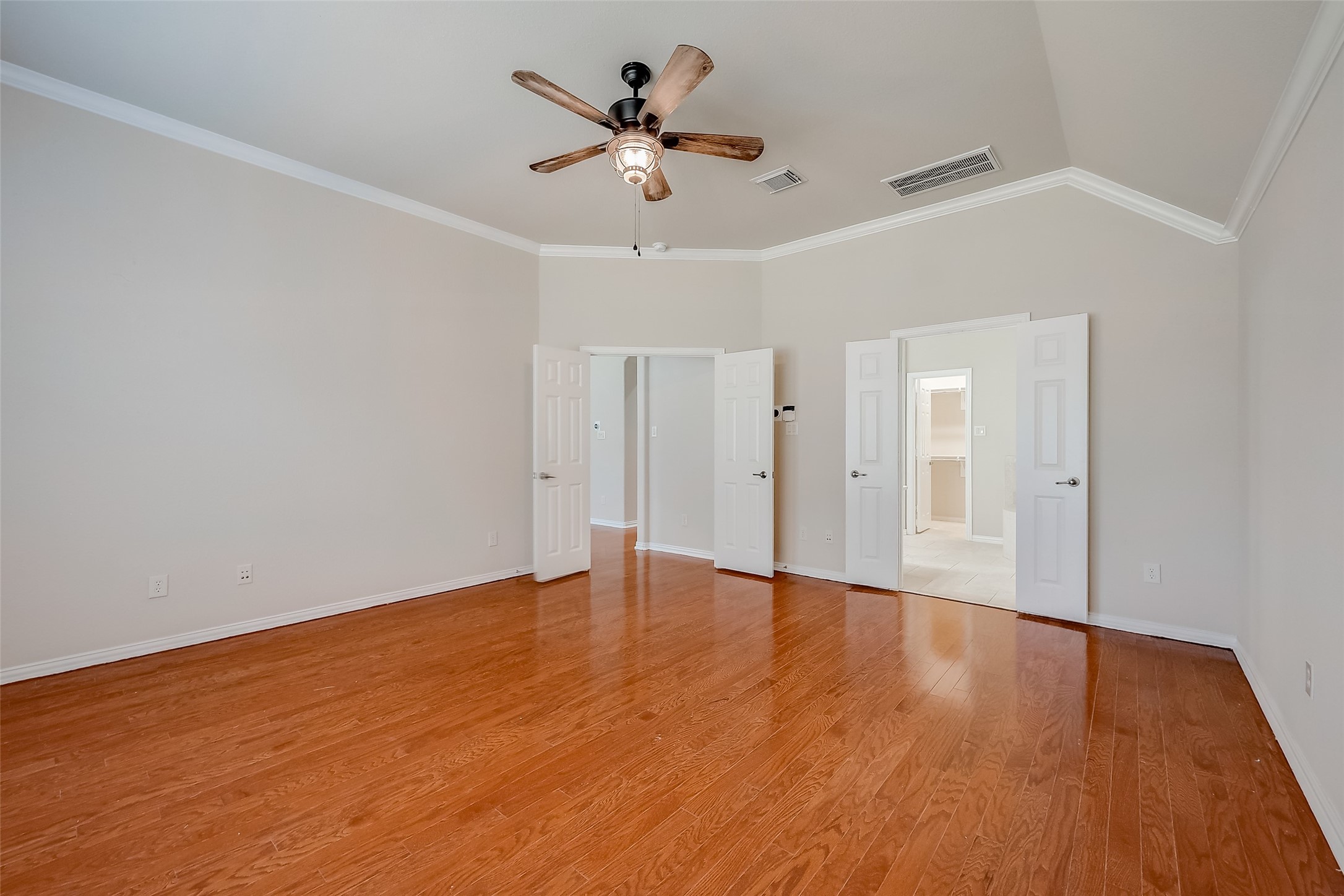 7206 Spring Meadow Lane Katy, TX 77494 - Photo 37 of 50 a view of an empty room with wooden floor