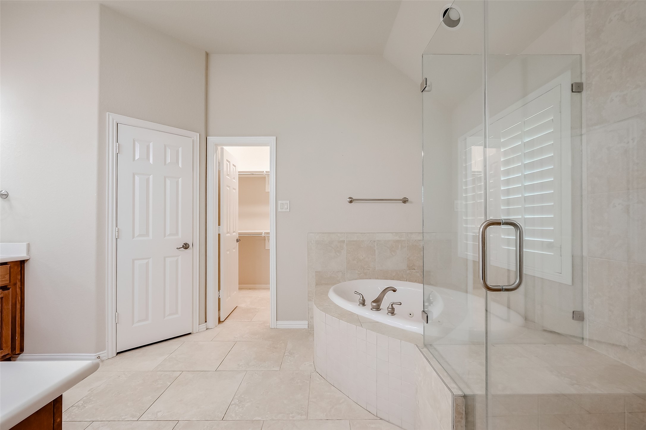 7206 Spring Meadow Lane Katy, TX 77494 - Photo 39 of 50 a bathroom with a bathtub and shower