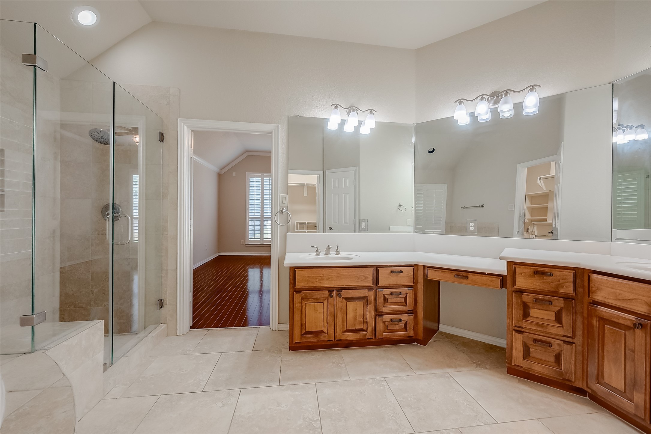 7206 Spring Meadow Lane Katy, TX 77494 - Photo 42 of 50 a spacious bathroom with a double vanity sink a mirror and a bathtub