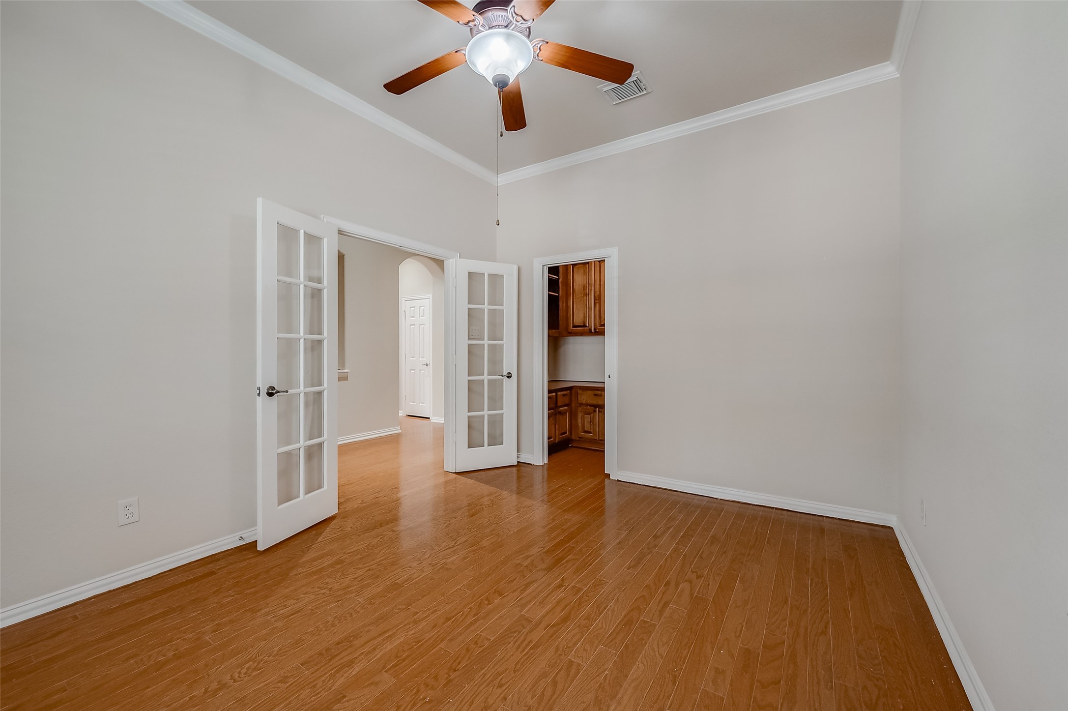 7206 Spring Meadow Lane Katy, TX 77494 - Photo 8 of 50 a view of an empty room with wooden floor