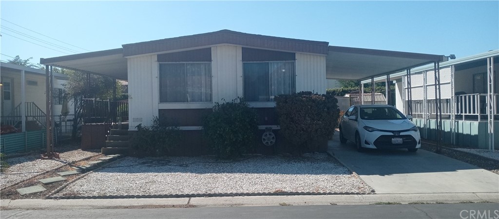 4000 Pierce Street, Unit 199 Riverside, CA 92505 - Photo 1 of 1 a front view of a house