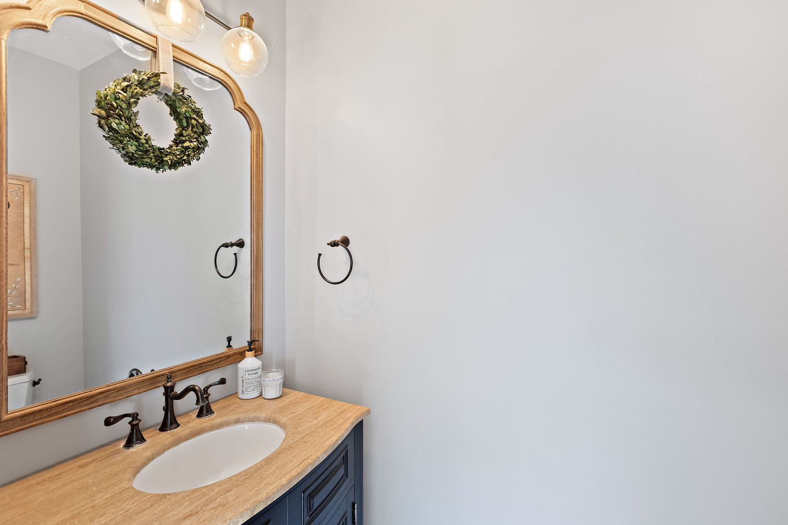 28679 West Heritage Oaks Road Barrington, IL 60010 - Photo 20 of 42 a bathroom with a sink and a mirror