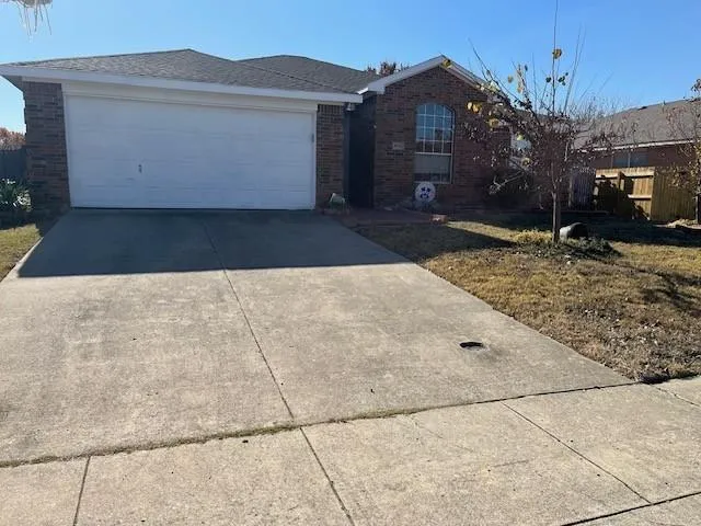 a view of a house with a snow in the yard