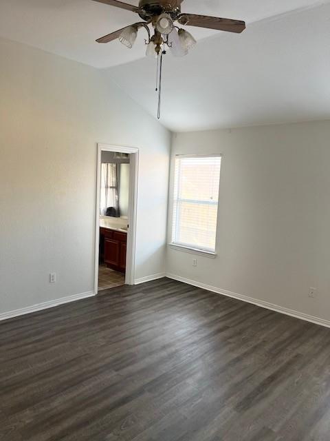 4832 Fox Ridge Lane McKinney, TX 75071 - Photo 15 of 29 an empty room with wooden floor chandelier and windows