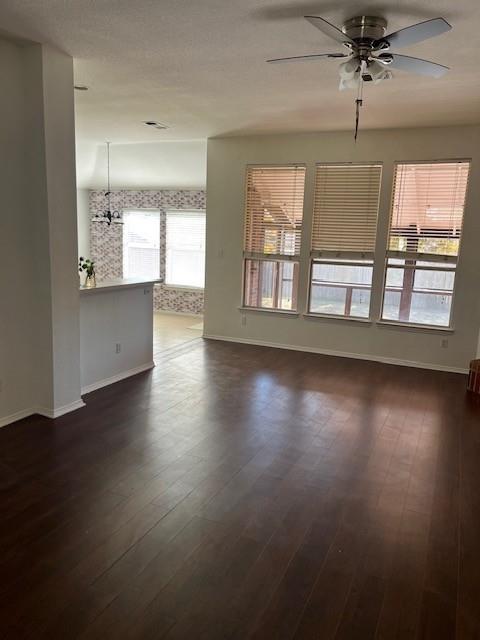 4832 Fox Ridge Lane McKinney, TX 75071 - Photo 5 of 29 an empty room with wooden floor and windows