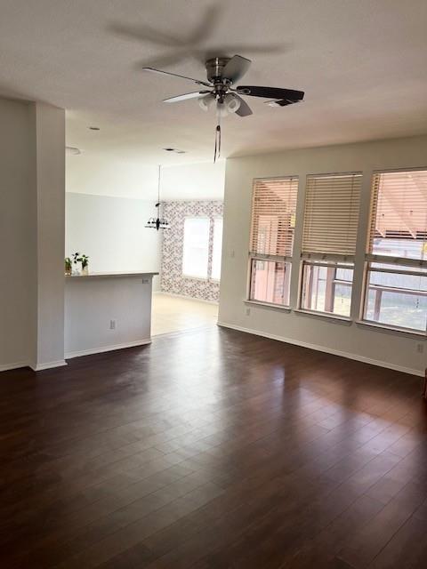 4832 Fox Ridge Lane McKinney, TX 75071 - Photo 7 of 29 an empty room with wooden floor and windows