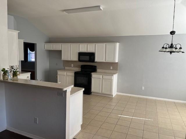 4832 Fox Ridge Lane McKinney, TX 75071 - Photo 8 of 29 a kitchen with a sink a stove and cabinets