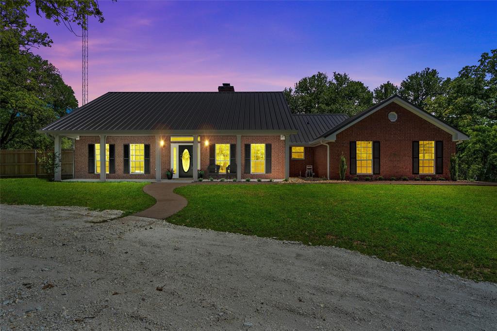 6640 Old Mexia Road Waco, TX 76705 - Photo 1 of 1 a front view of a house with a yard