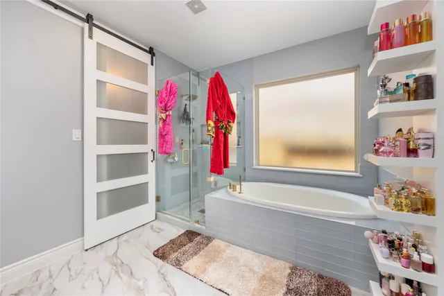 a room with a bed and a window