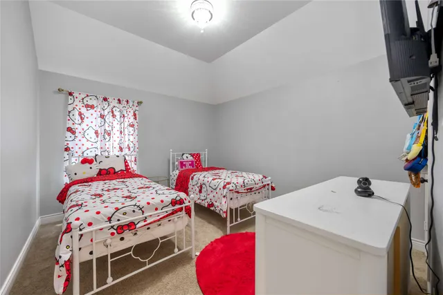 a bathroom with a sink toilet and vanity