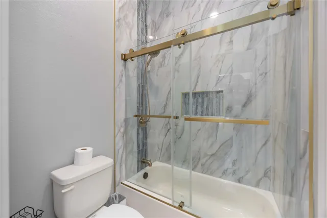 a bathroom with a sink a vanity and a mirror