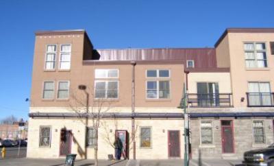 1131 21st Street Denver, CO 80205 - Photo 1 of 1 a front view of a building with a porch