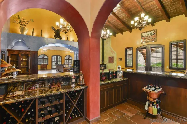 a kitchen with stainless steel appliances granite countertop a stove and cabinets