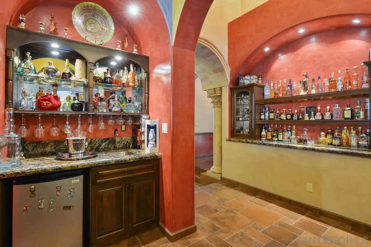 14545 Highway 67 Poway, CA 92064 - Photo 12 of 58 a kitchen with stainless steel appliances granite countertop a stove and cabinets
