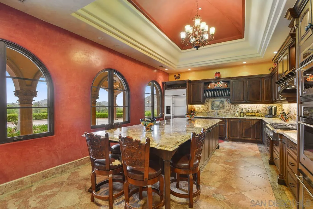14545 Highway 67 Poway, CA 92064 - Photo 13 of 58 a view of a dining room with furniture and chandelier