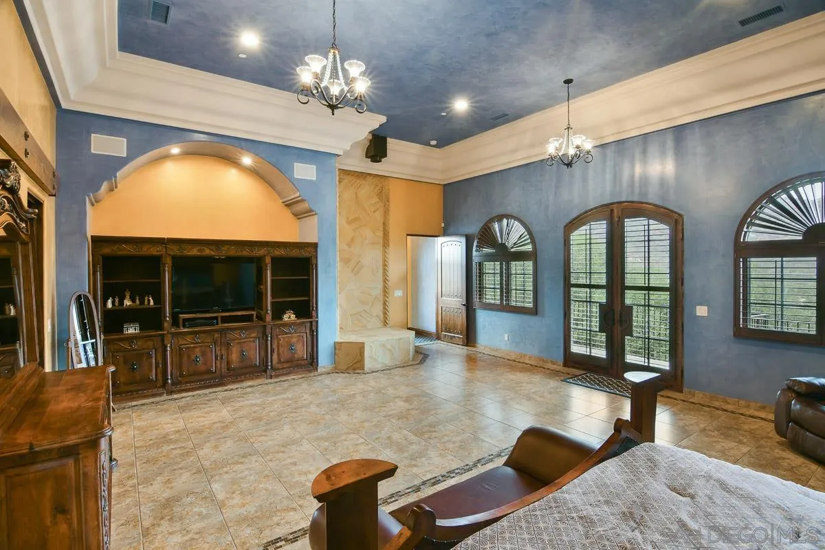 14545 Highway 67 Poway, CA 92064 - Photo 20 of 58 a view of a livingroom with furniture chandelier and window