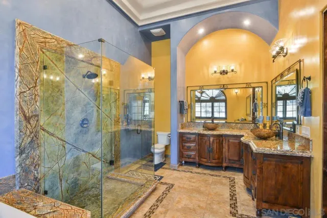 a bathroom with a tub and a shower