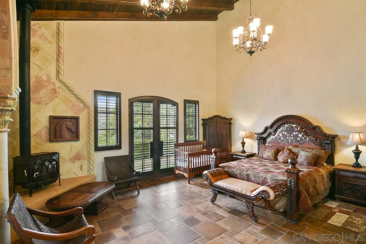 14545 Highway 67 Poway, CA 92064 - Photo 26 of 58 a living room with furniture a fireplace and a flat screen tv