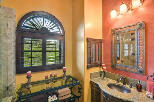 a view of an empty room with windows