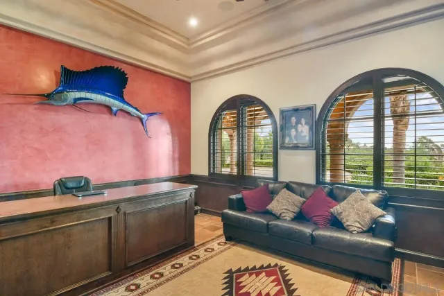 a kitchen that has a sink and a stove