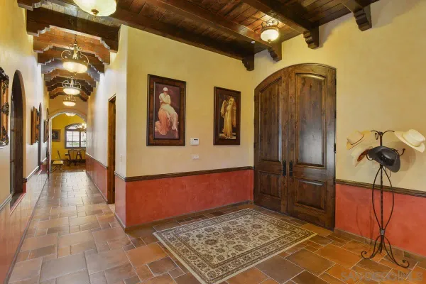 a view of lobby with mirror