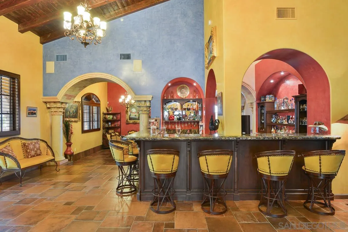 14545 Highway 67 Poway, CA 92064 - Photo 9 of 58 a view of a swimming pool with a table and chairs