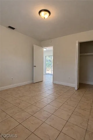 an empty room & glass door space