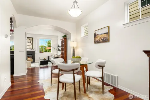 a view of a livingroom with furniture and wooden floor