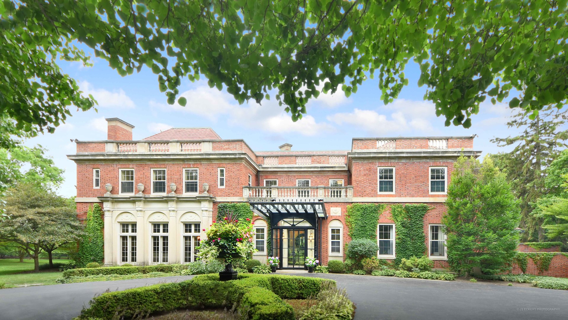 747 East Deerpath Road Lake Forest, IL 60045 - Photo 4 of 15 front view of a house with a garden