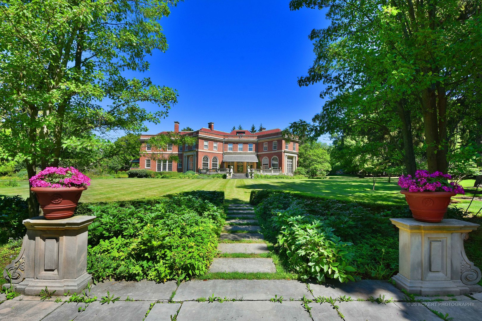 747 East Deerpath Road Lake Forest, IL 60045 - Photo 10 of 15 a front view of a house with a garden
