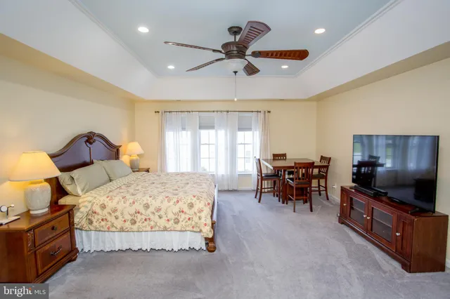 a bedroom with a bed and furniture